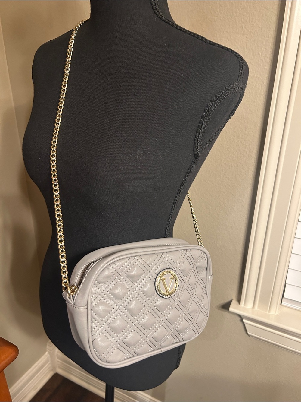 Quilted Light Gray Crossbody Bag with Gold Chain and V Logo